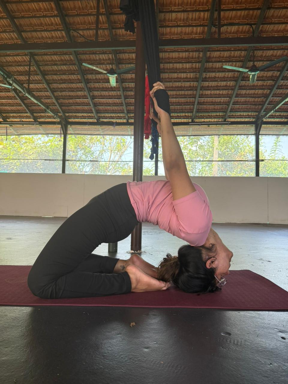 Shruti practising camel pose